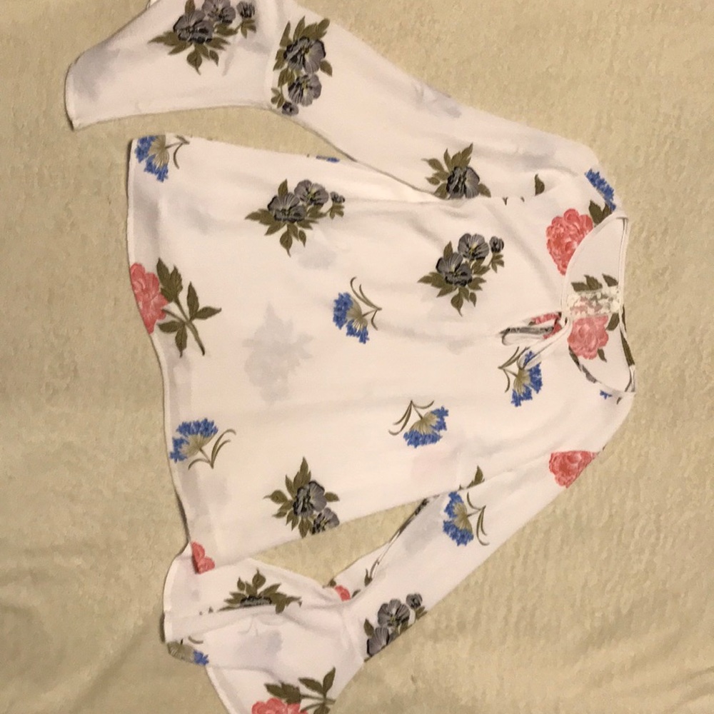 White bell sleeved blouse